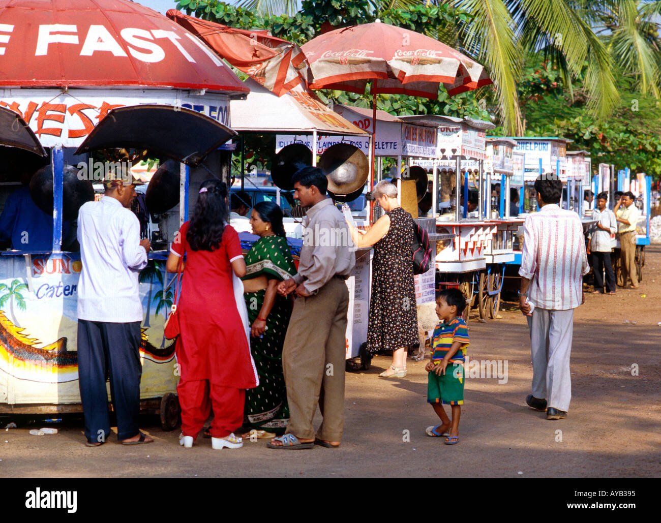 Traders selling Indian food snacks etc at Colvi Goa Stock Photo