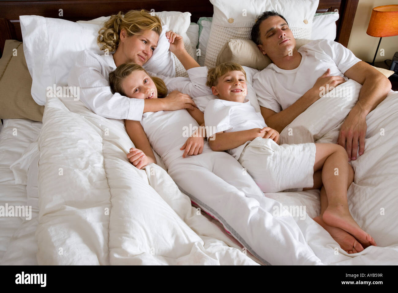 Father waking up son hi-res stock photography and images - Alamy