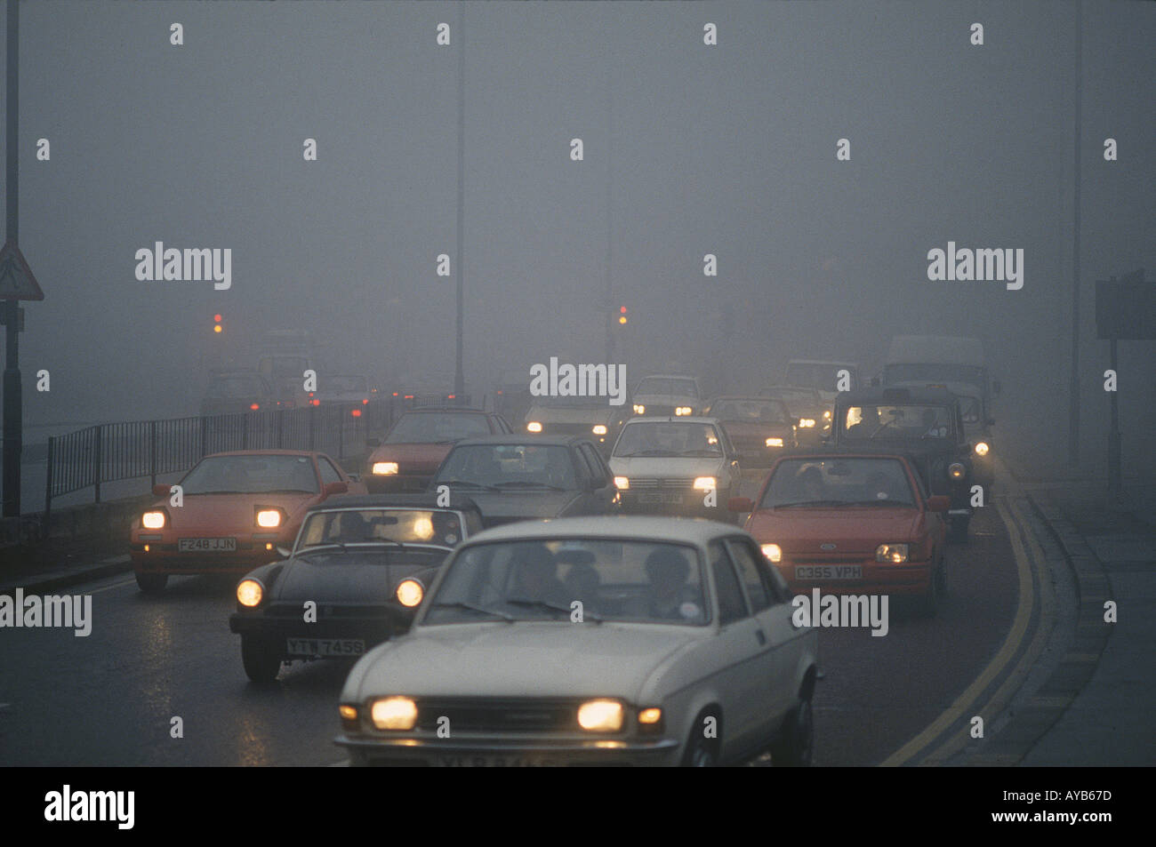 Traffic on foggy day in London Stock Photo