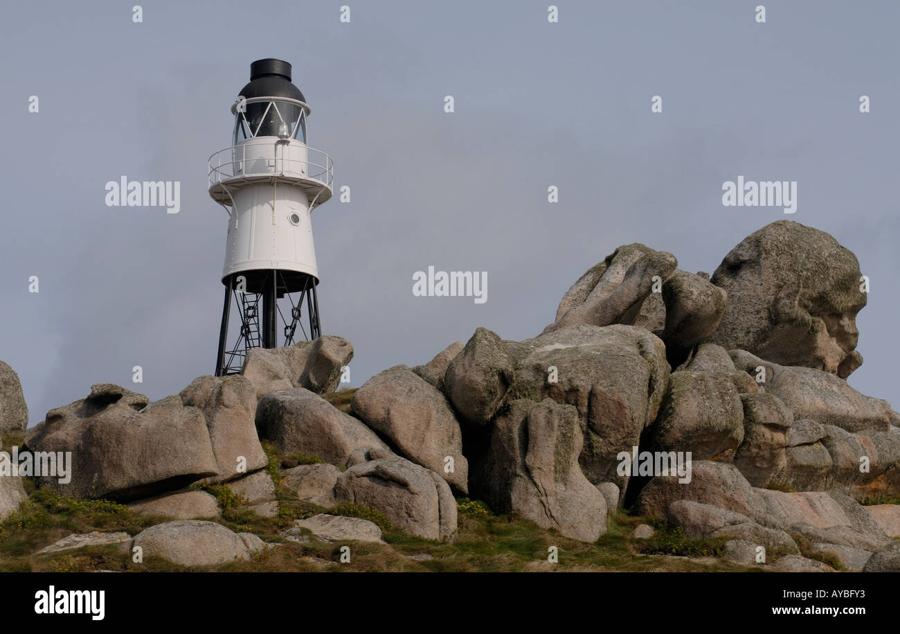 The small automatic black and white Peninnis light on the granite rocks of Peninnis Head Stock Photo