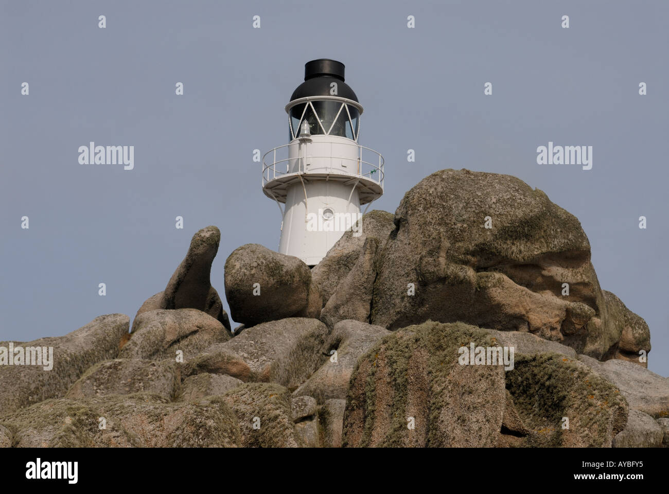 The small automatic black and white Peninnis light on the granite rocks of Peninnis Head Stock Photo