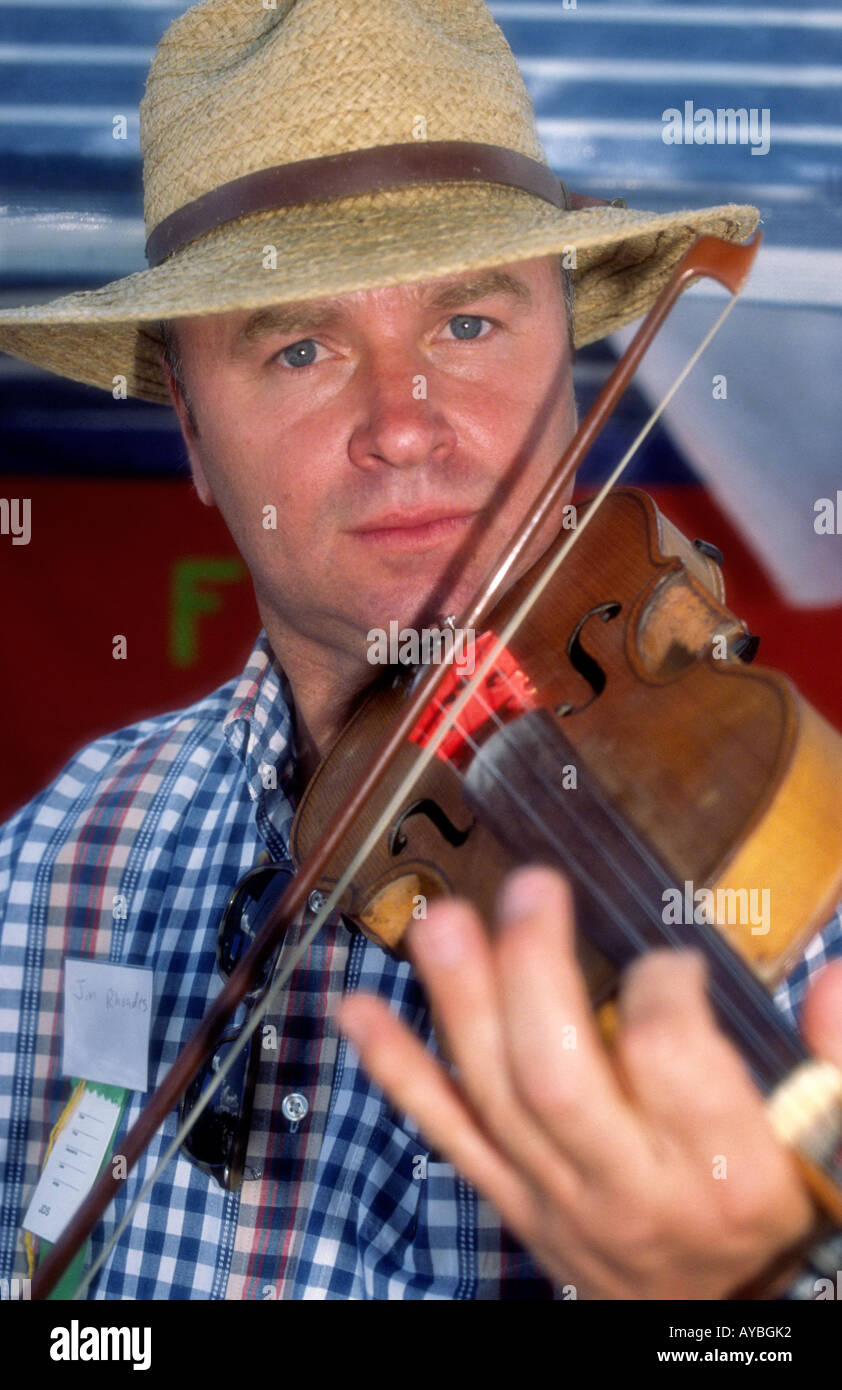 MR 0259 James Rhoades fiddles furiously at the Cherry Festival in High