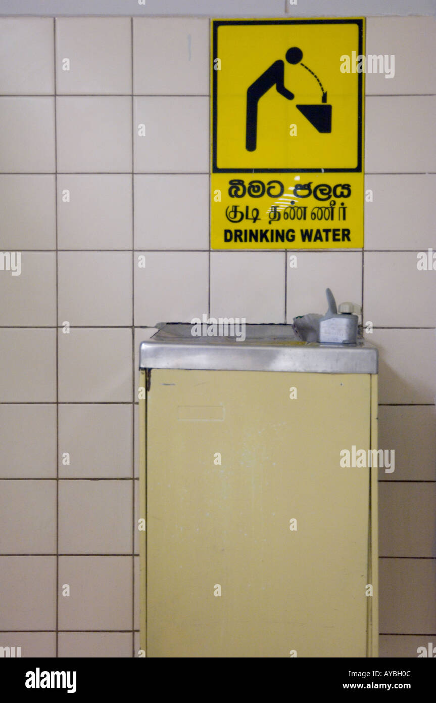 Drinking water sign and water fountain at the airport in Colombo, Sri Lanka. Stock Photo