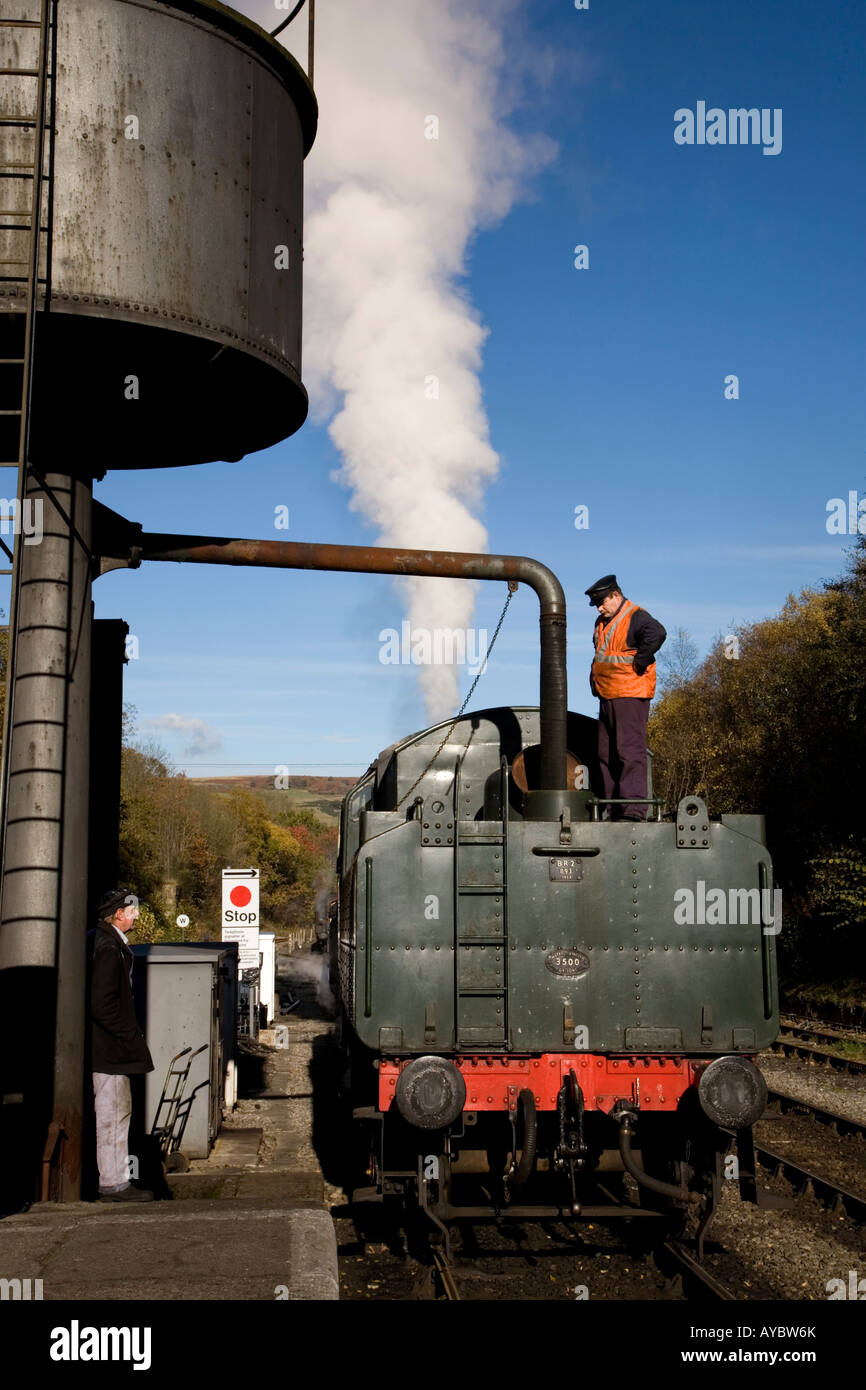 Steam Train Taking Water High Resolution Stock Photography and Images