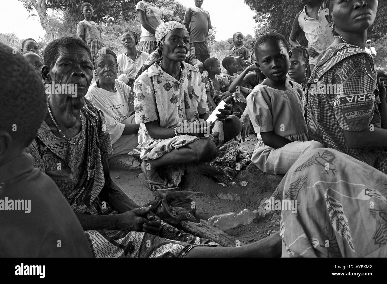 A group of ladies wait for their Sleeping Sickness results after being screened for the desease Stock Photo