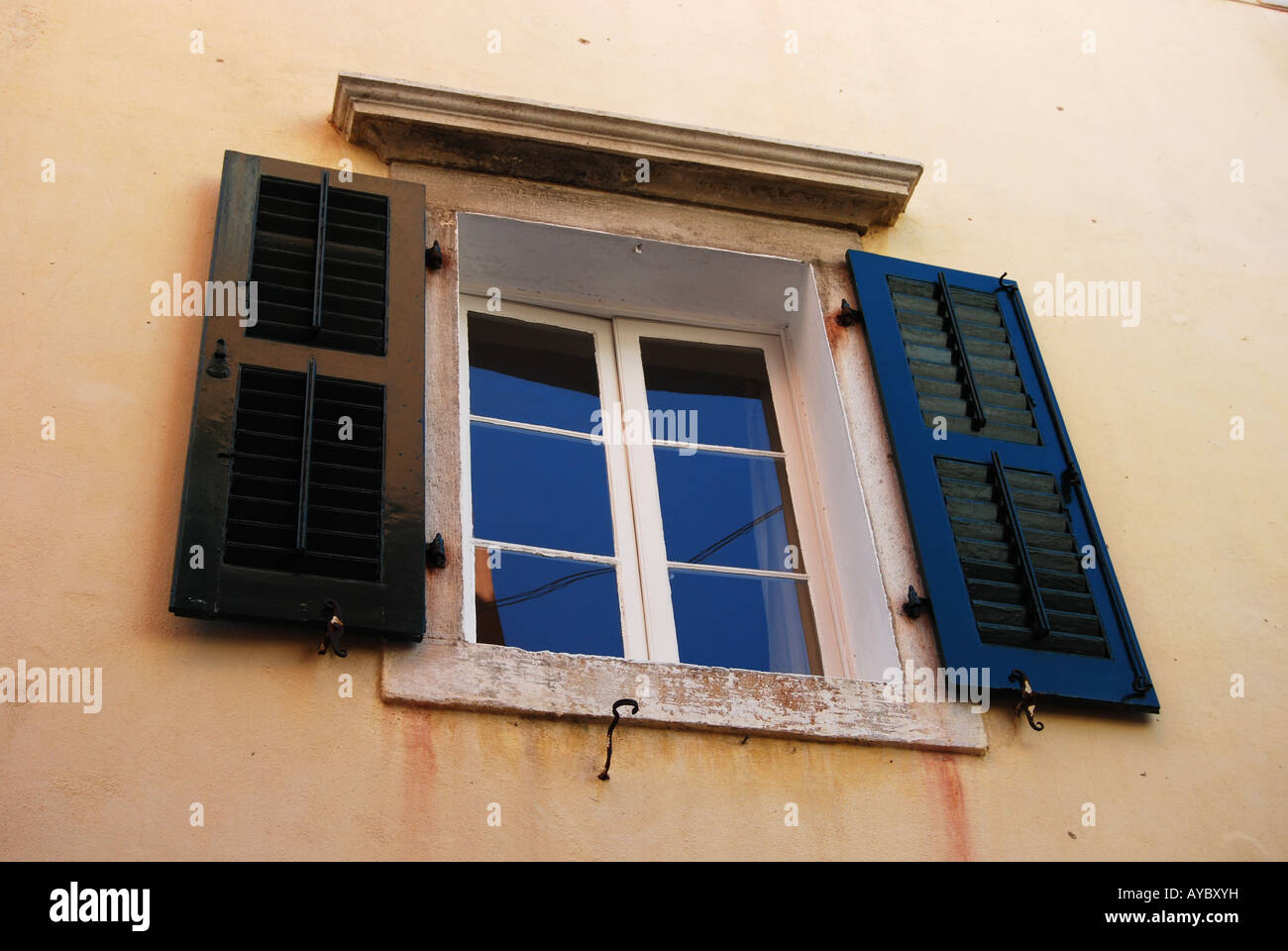 An open window from a traditional Mediterranean city house Stock Photo