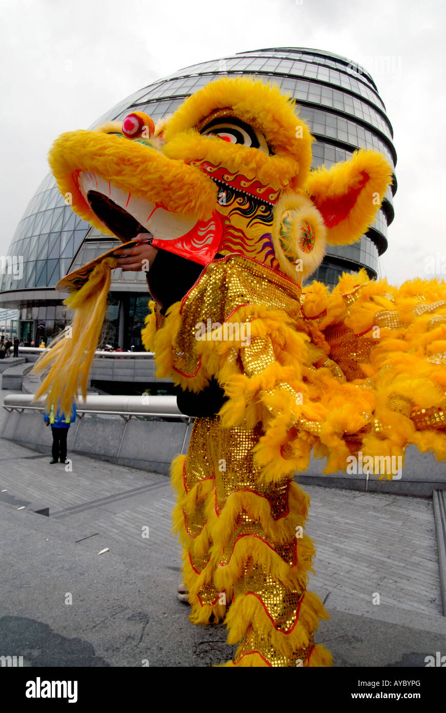 UK. CHINESE DRAGON OUTSIDE GLA HQ DURING RELAY OF OLYMPIC TORCH EN ROUTE TO BEIJING Photo © Julio Etchart Stock Photo
