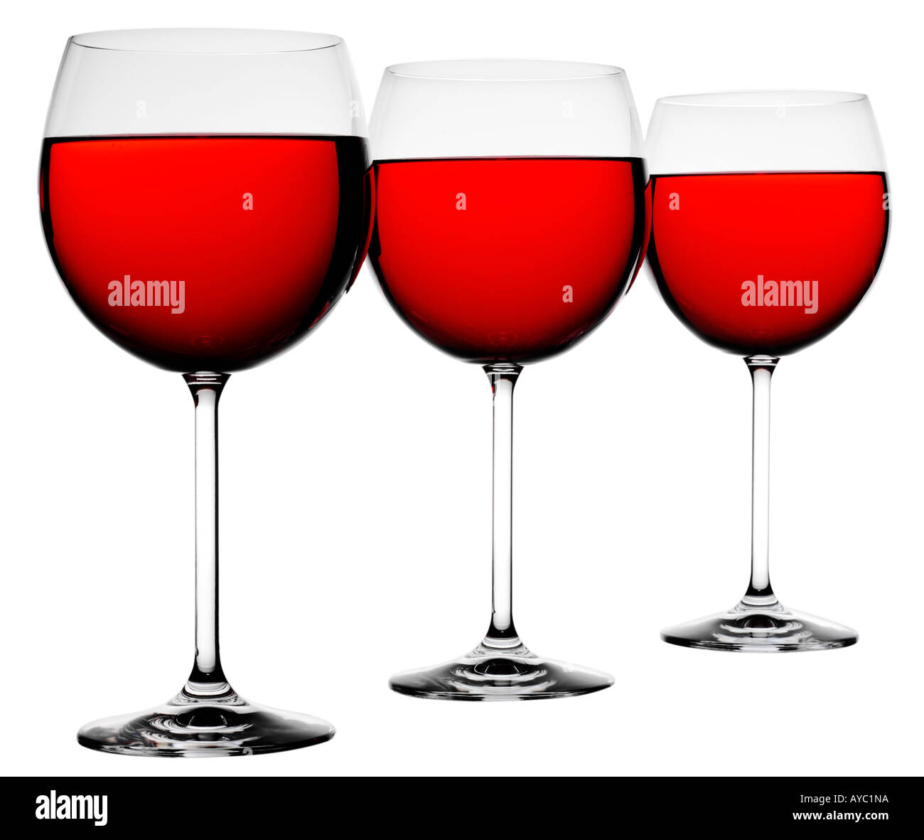 THREE GLASSES OF RED WINE CUT OUT Stock Photo