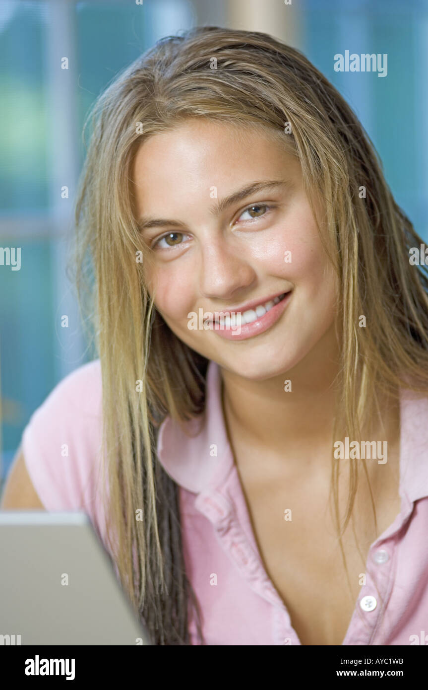 Caucasian teenage girl with laptop computer Stock Photo
