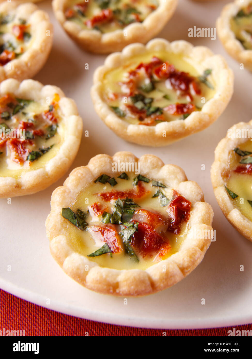 Mini sun dried tomato quiches canapes hi-res stock photography and images -  Alamy