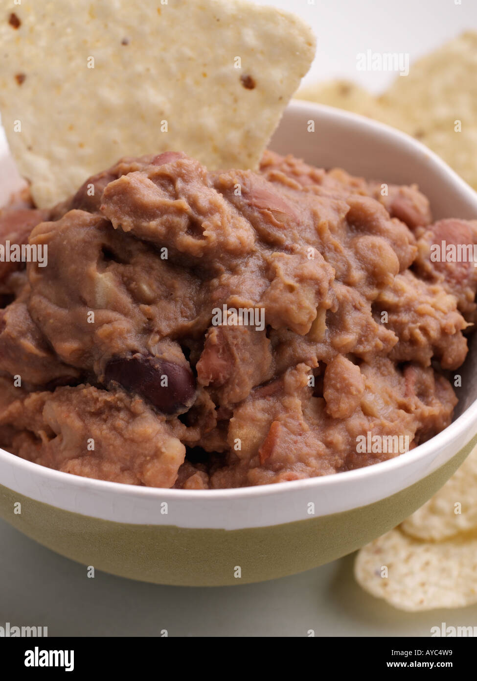Bowl of refried beans and tacos Stock Photo Alamy
