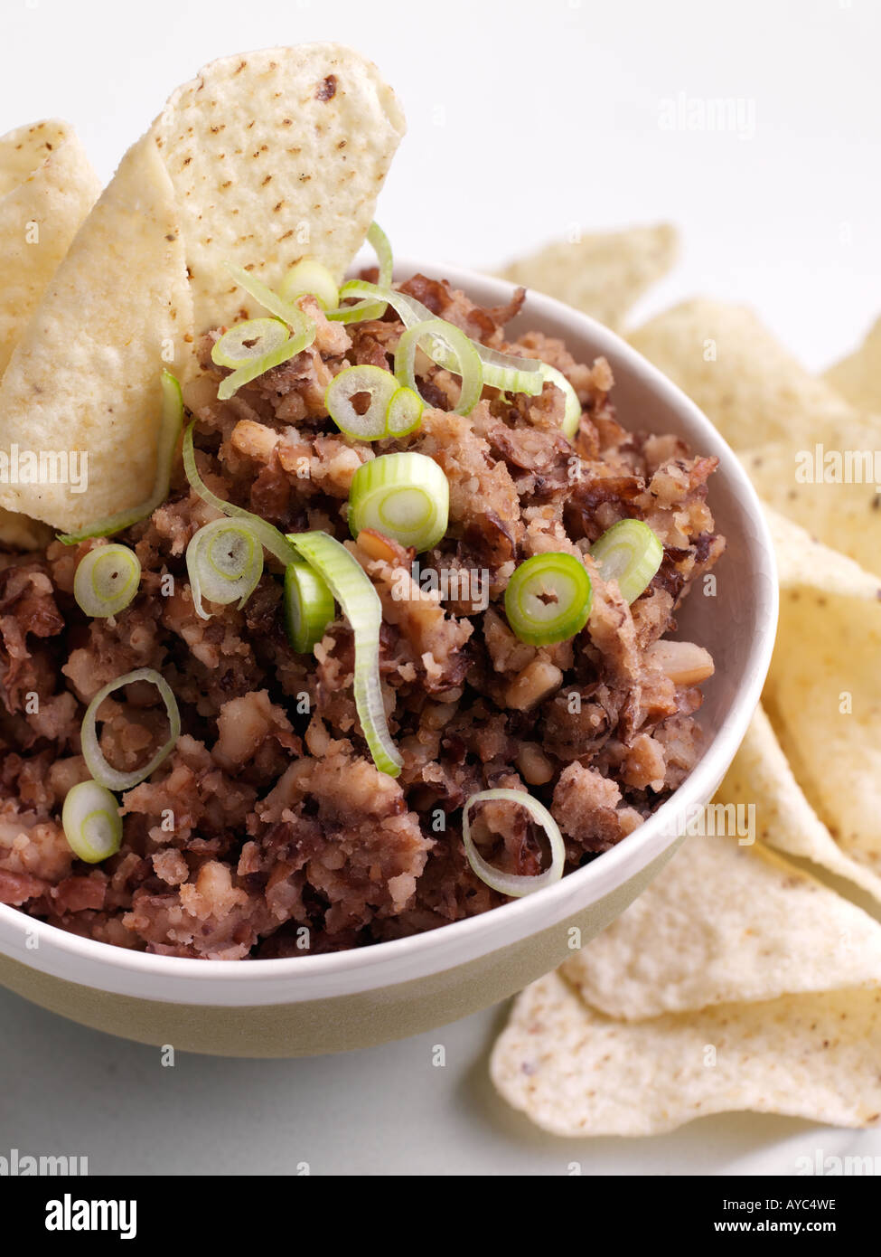 Bowl of refried beans and tacos Stock Photo - Alamy