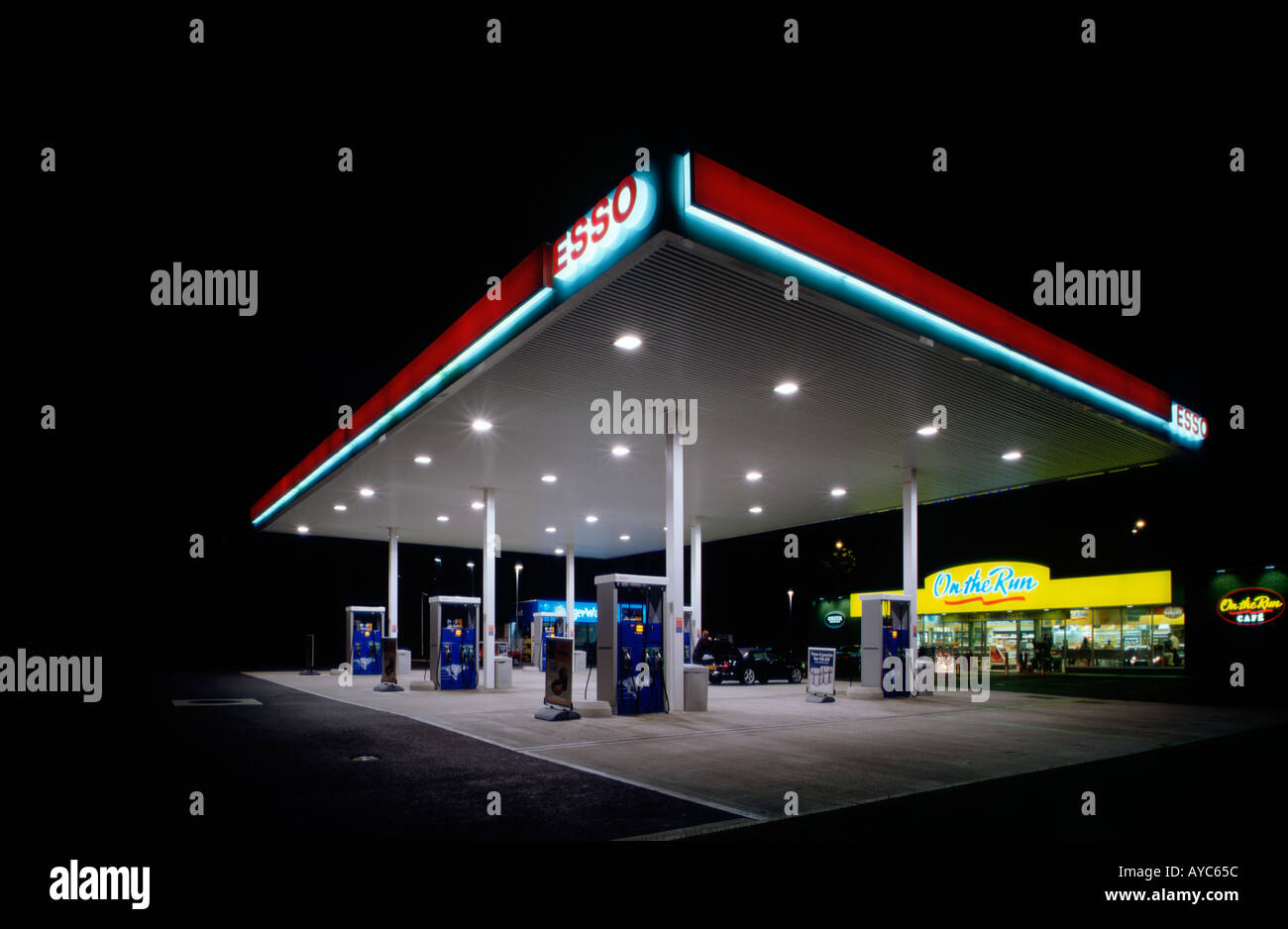 Esso petrol station by night near London UK England Britain Stock Photo