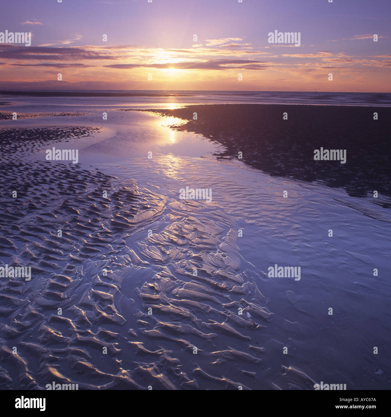 Evening sunlight on patterns in the sand at Formby Point beach Nr ...