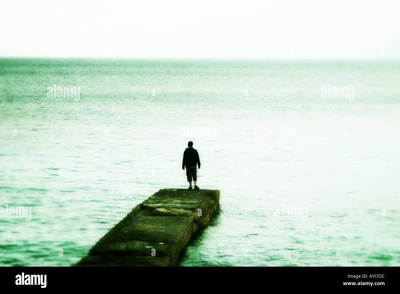 Boy looking at sea hi-res stock photography and images - Alamy