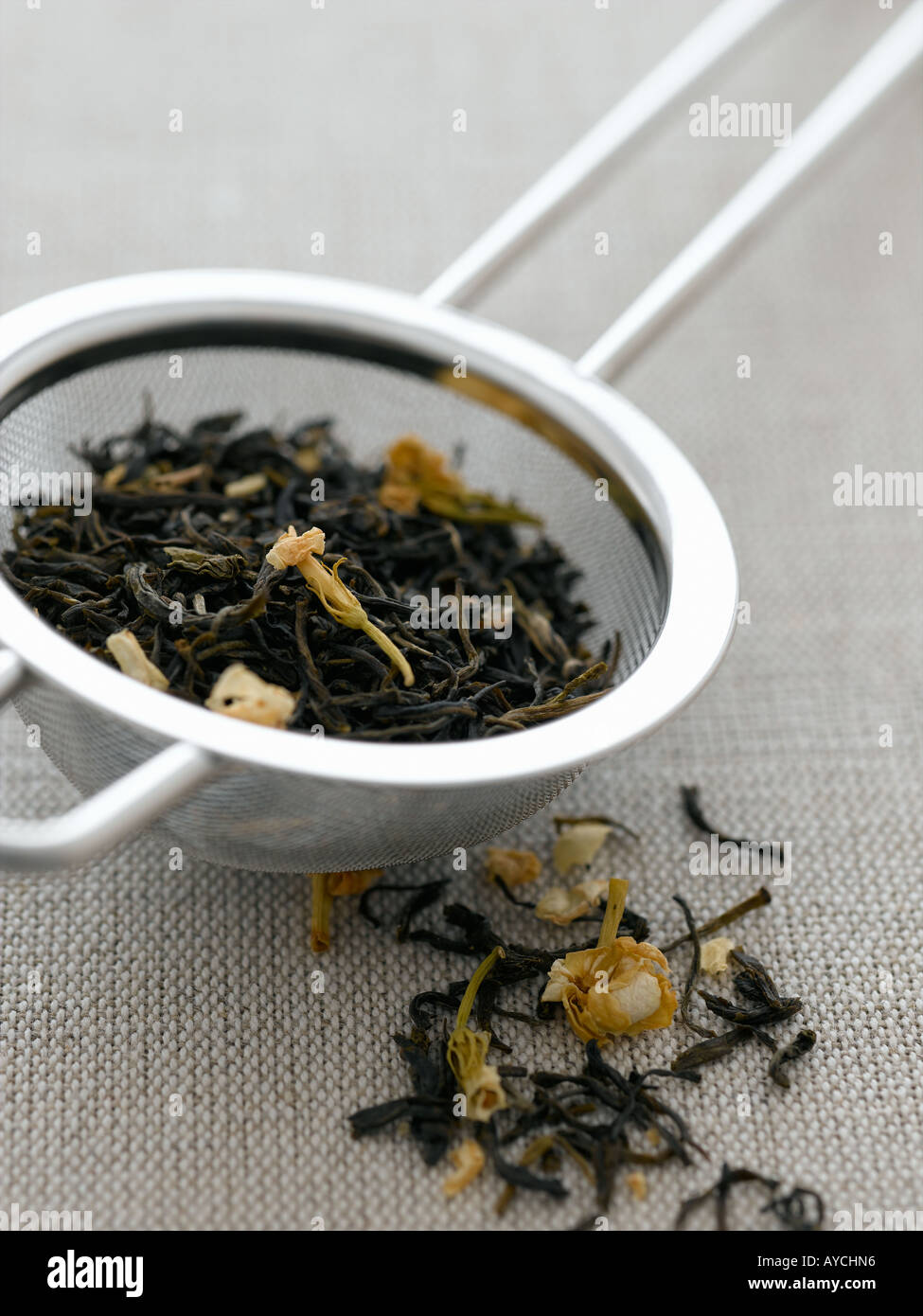 Jasmine tea leaves and tea strainer - high end Hasselblad 61mb digital image Stock Photo