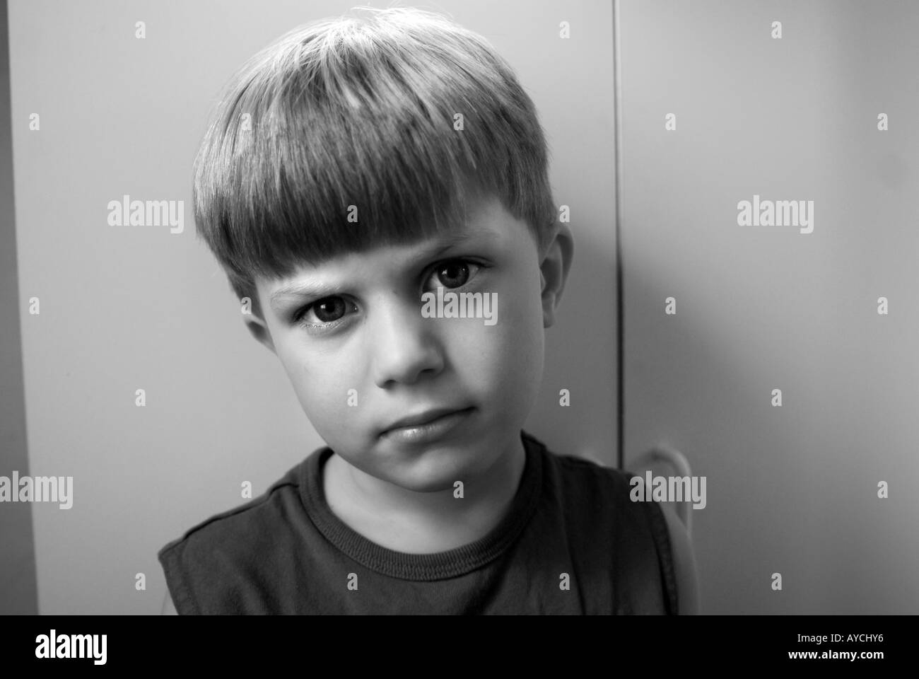 Small Boy looking serious Stock Photo