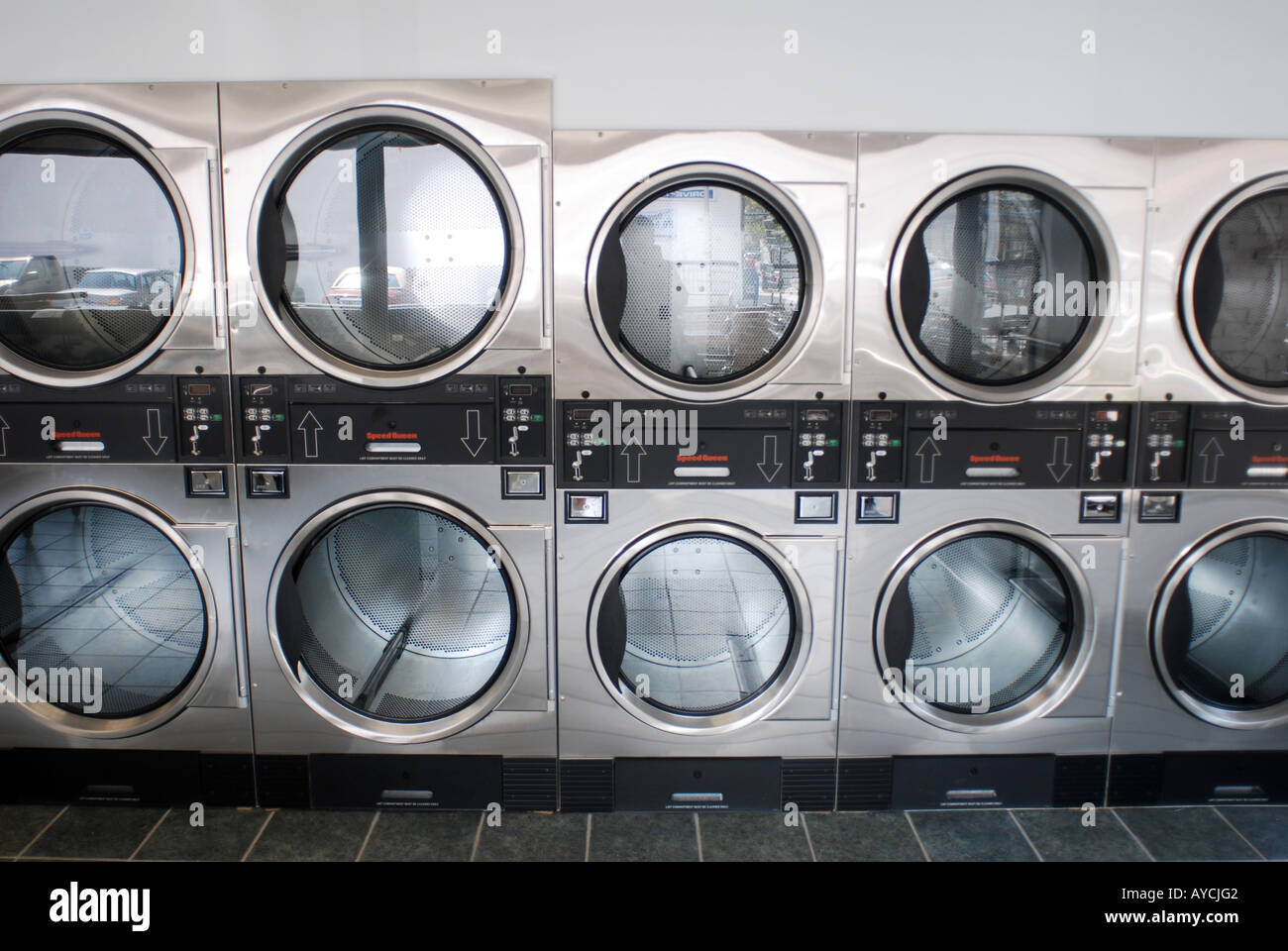 Rows of Coin Operated Laundromat dryers Stock Photo Alamy