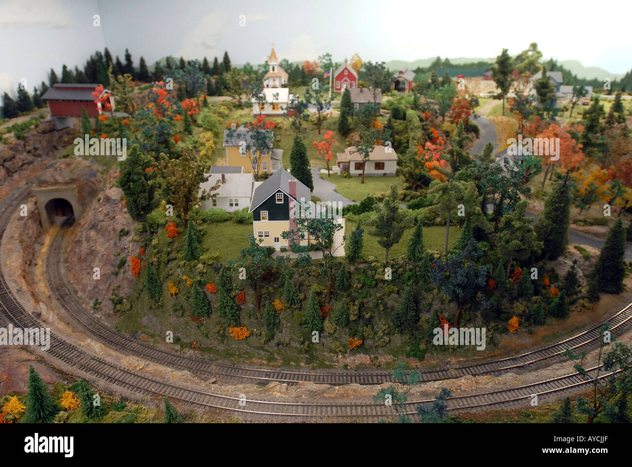 Model Train railroad detail with bend in tracks and tunnel in Connecticut USA Stock Photo