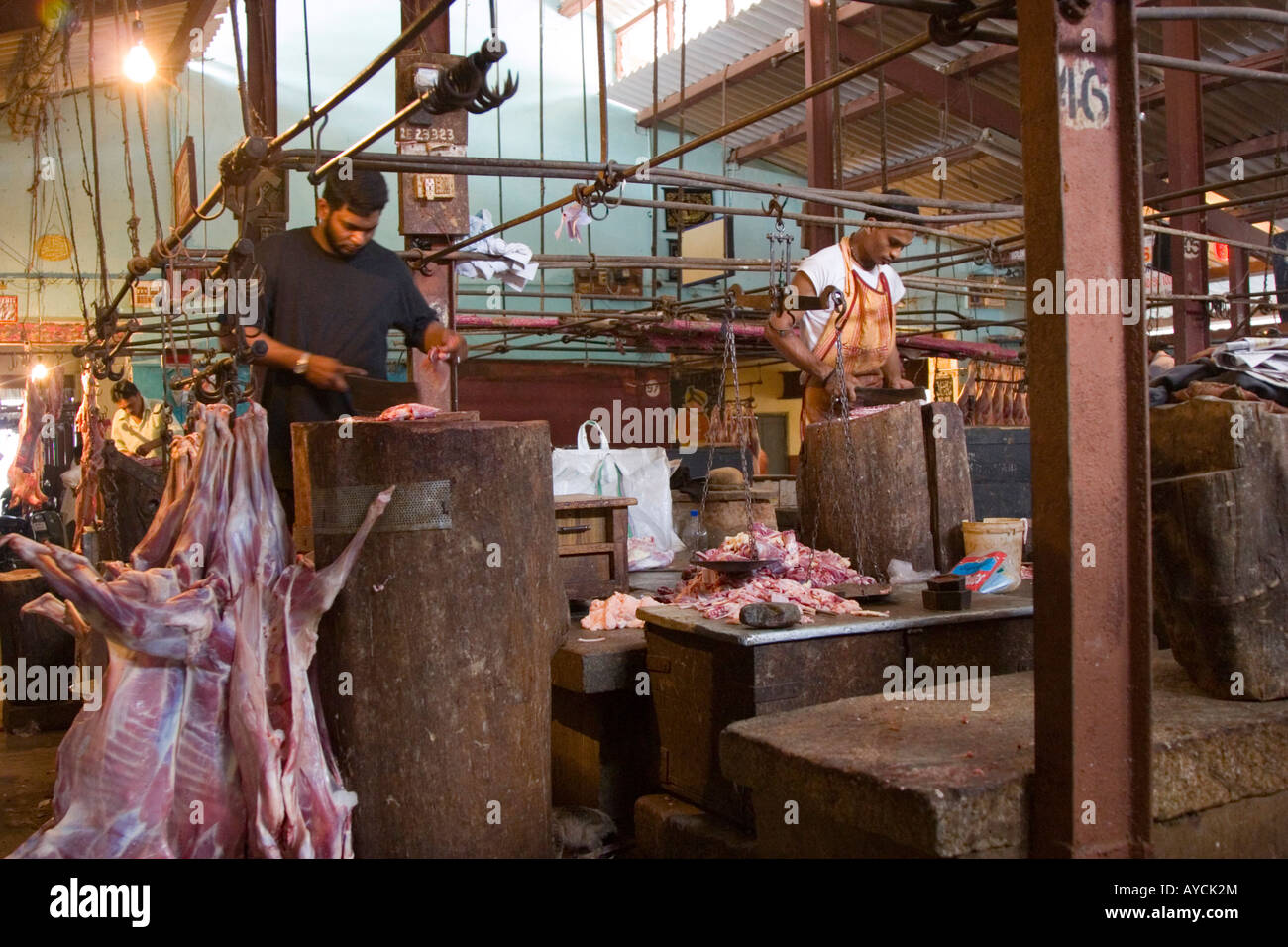 Meat hanging in butcher s shop Russel Market Bangalore Stock Photo Alamy