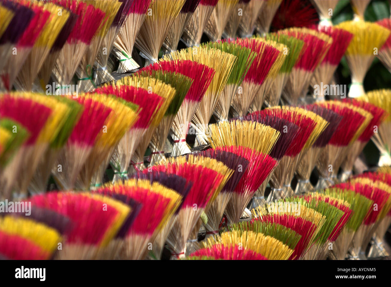 Colourful cinnamon incense stick display Tu Duc village near Hue