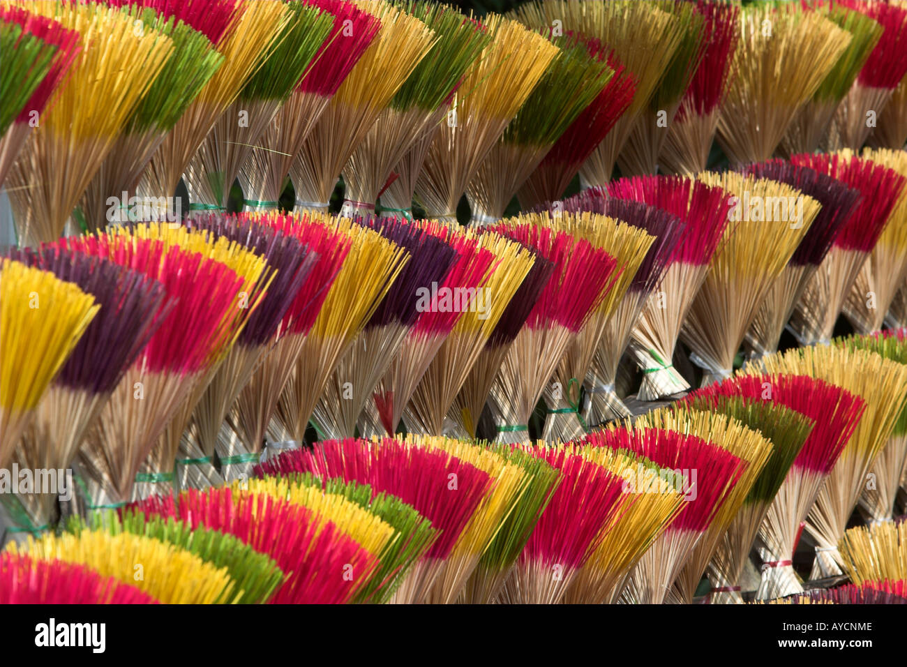 Colourful cinnamon incense stick display Tu Duc village near Hue