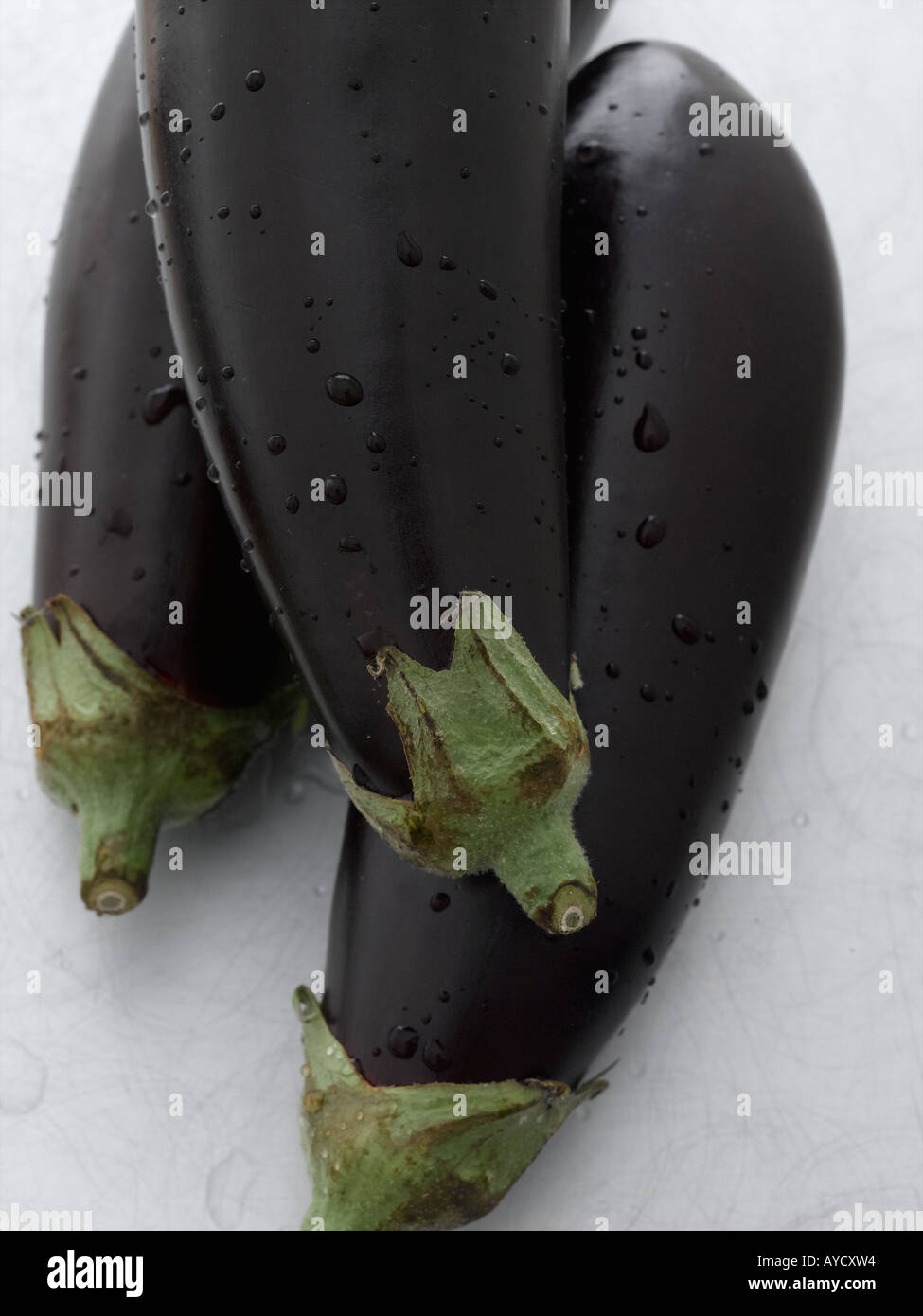 Aubergines on metal worktop - high end Hasselblad 61mb digital image Stock Photo