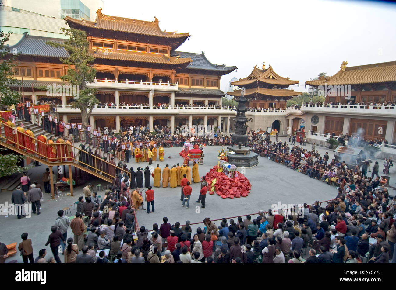 Crowded Buddhist religious procession at Jingan Temple, in Shanghai, China. Stock Photo
