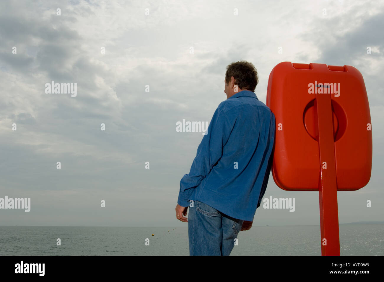 man looking out to sea Stock Photo - Alamy