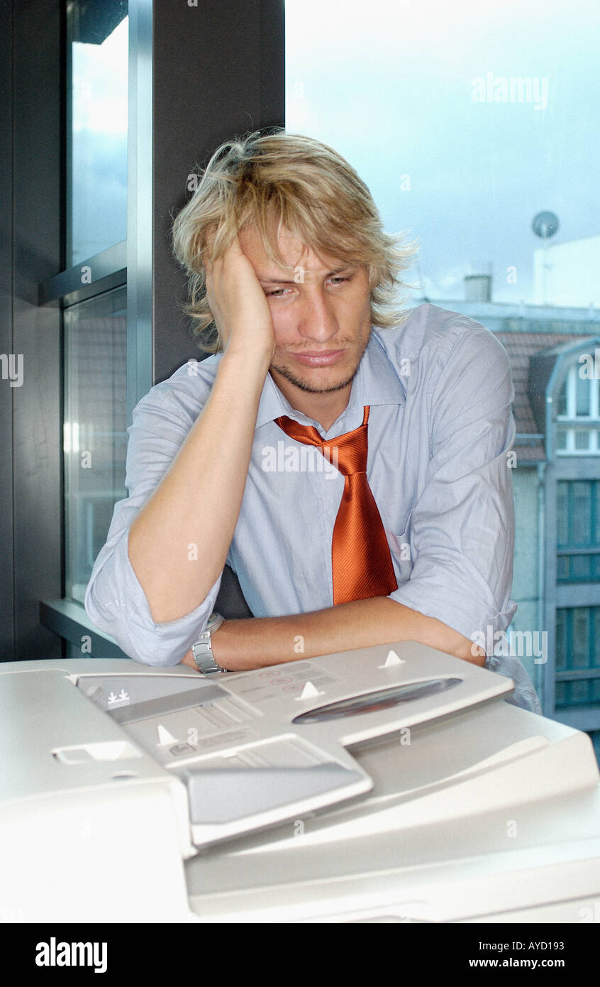 Portrait of bored office worker Stock Photo - Alamy