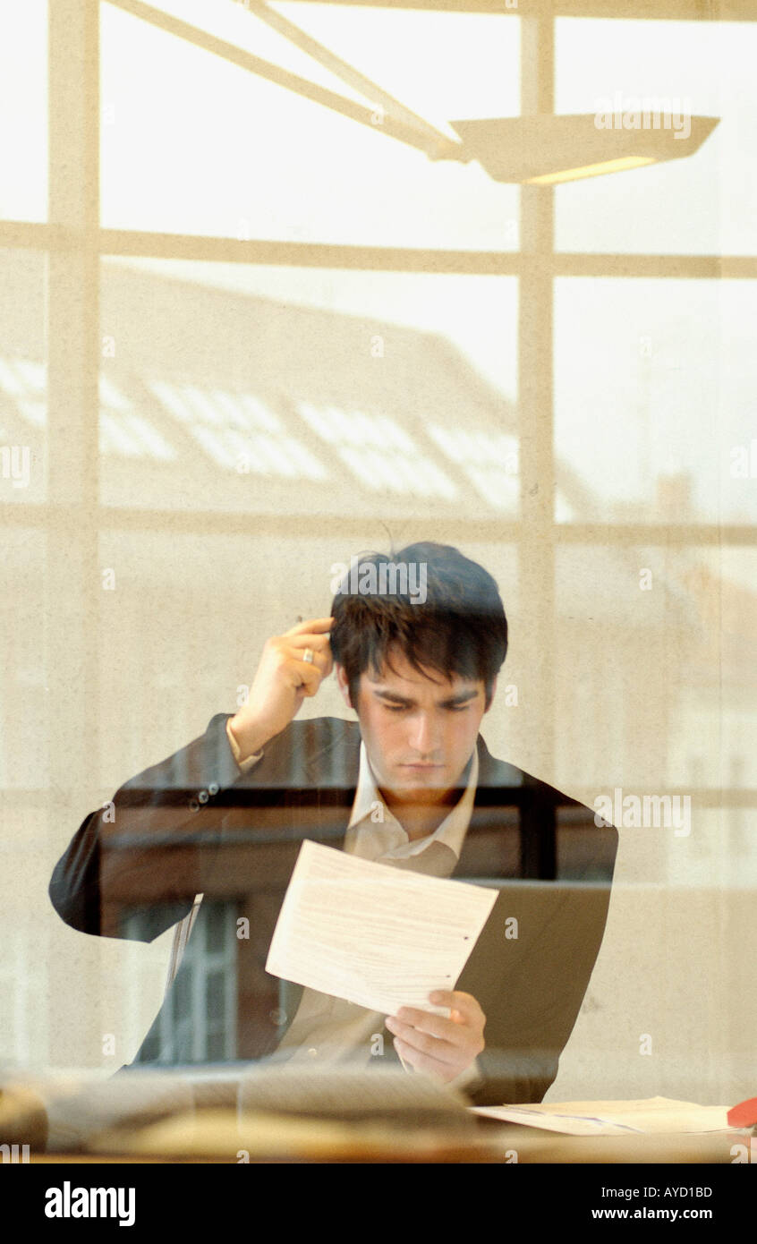 Confused looking businessman Stock Photo