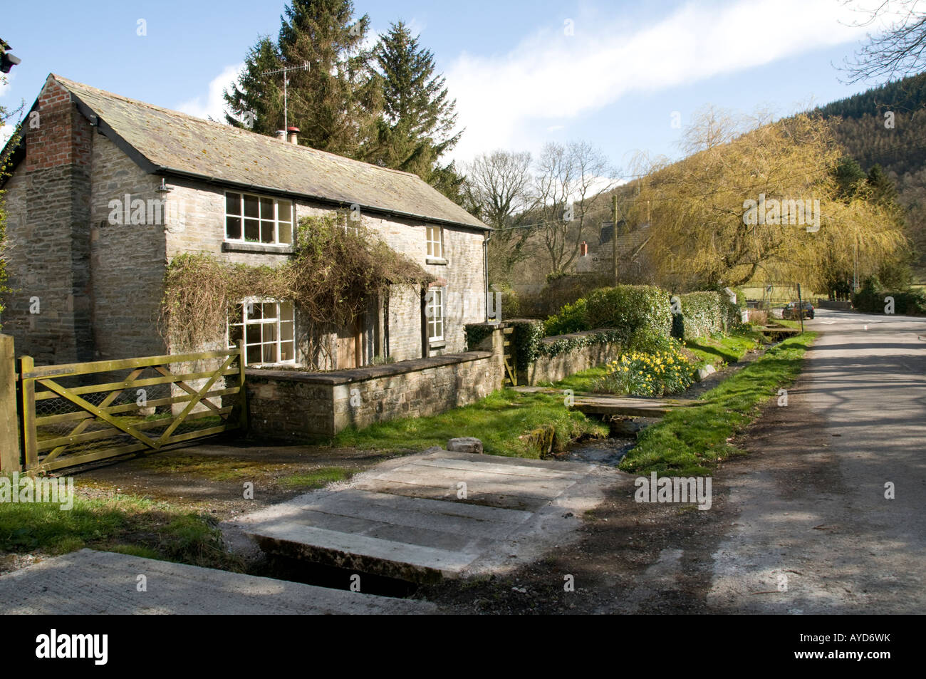 Houses in Water Street New Radnor village Powys Mid Wales UK a stream