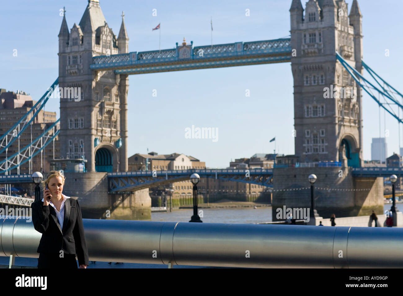 A beautiful young woman using her mobile phone in London England with