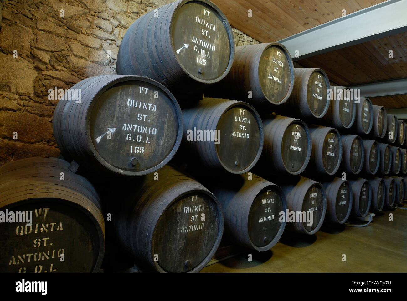 Porto Portugal Port Wine barrells stacked inside warehouse Stock Photo