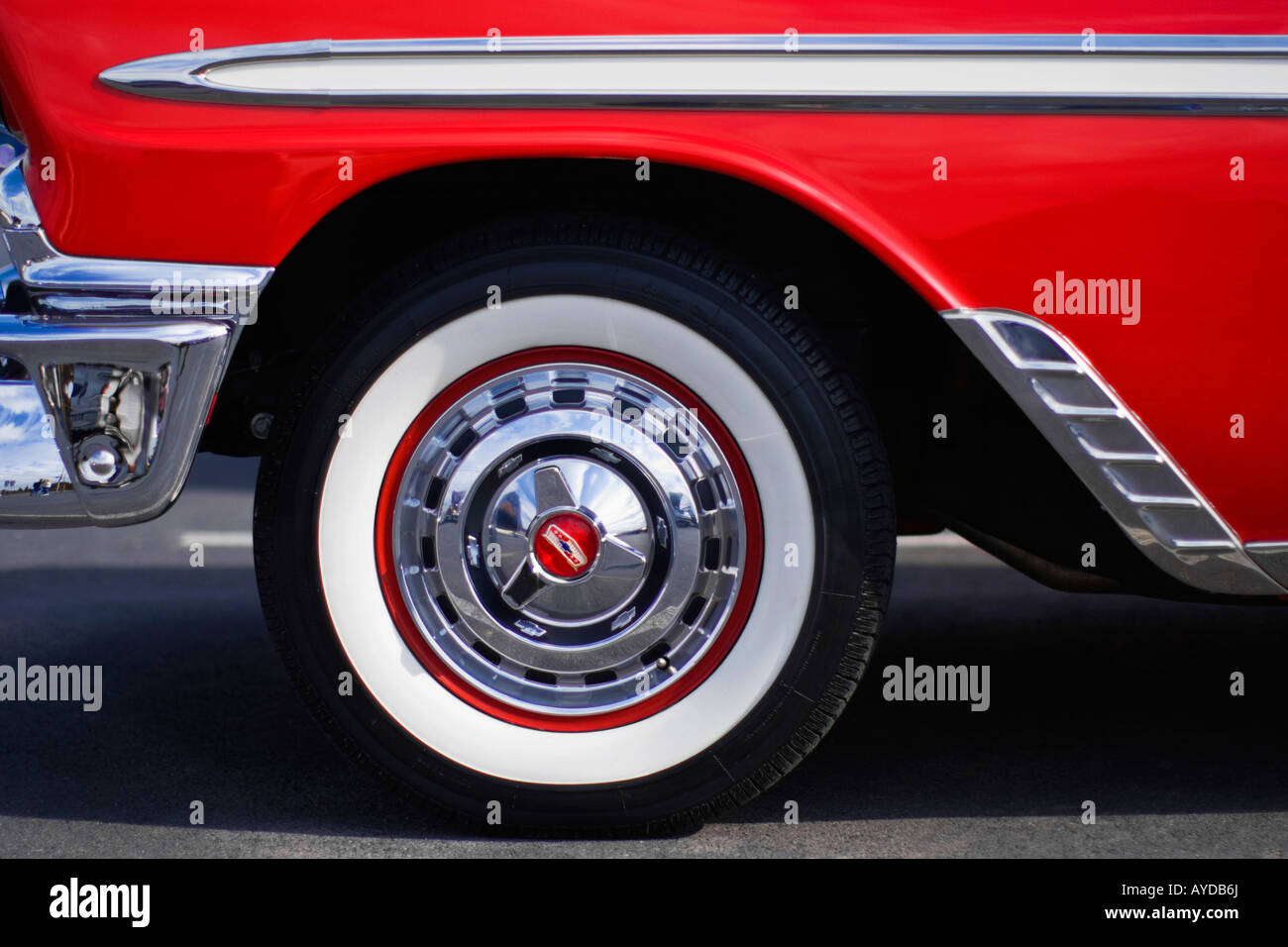 tight side shot of vintage red 1957 Chevrolet Belair showing front quarter panel of car Stock Photo