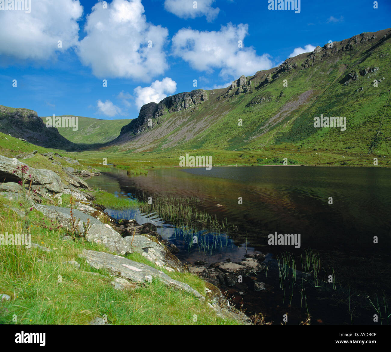 irish valley surrounded by high mountains Stock Photo Alamy