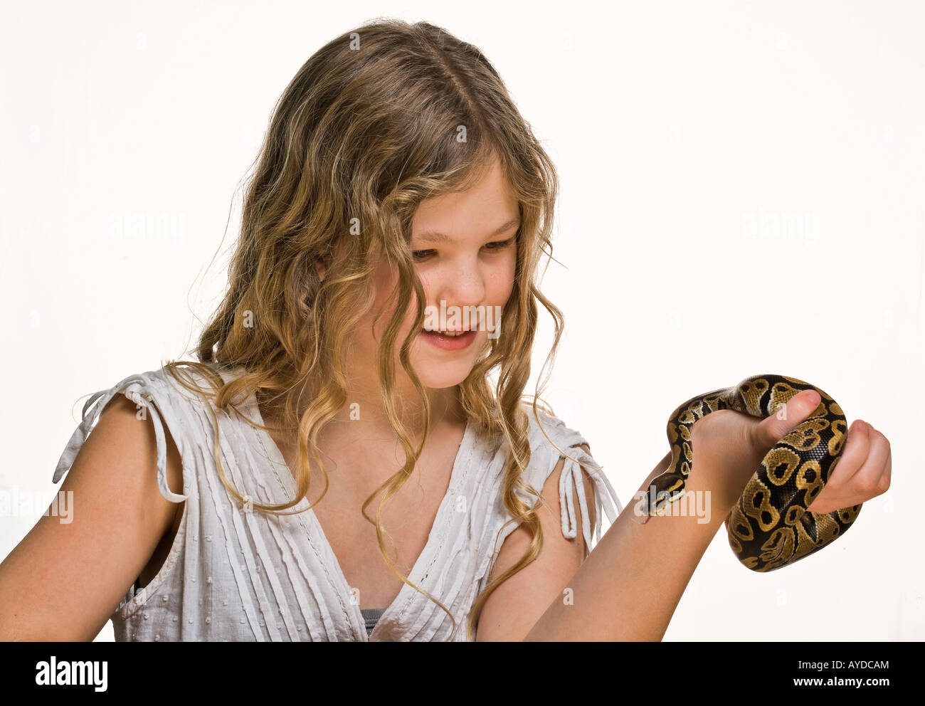 Young girl with her pet python snake Stock Photo - Alamy