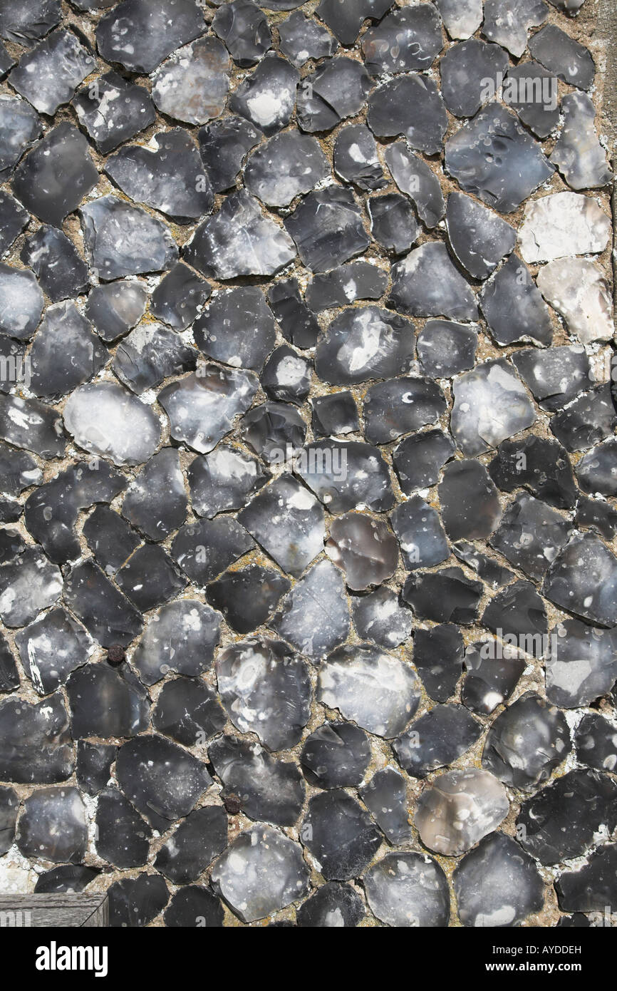 Split flint pebbles used in a wall of a building Stock Photo