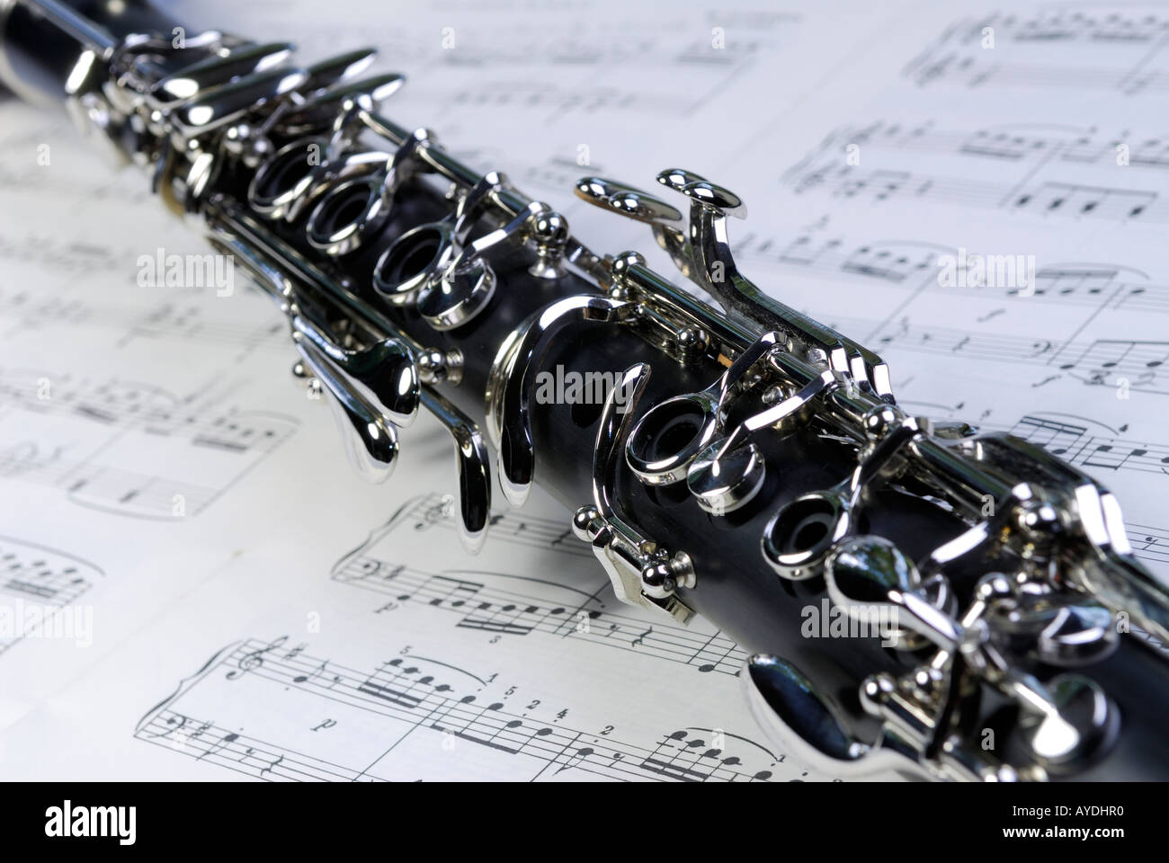 Close up of Boehm clarinet keywork on a sheet of music Stock Photo