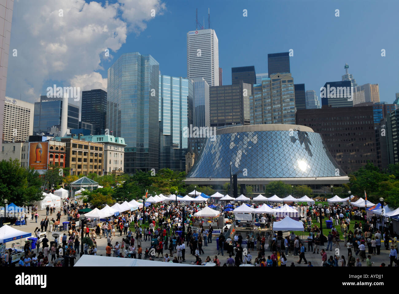 Taste of Toronto outdoor food festival in the Entertainment district between Metro Hall square and Roy Thompson Hall with downtown highrise towers Stock Photo