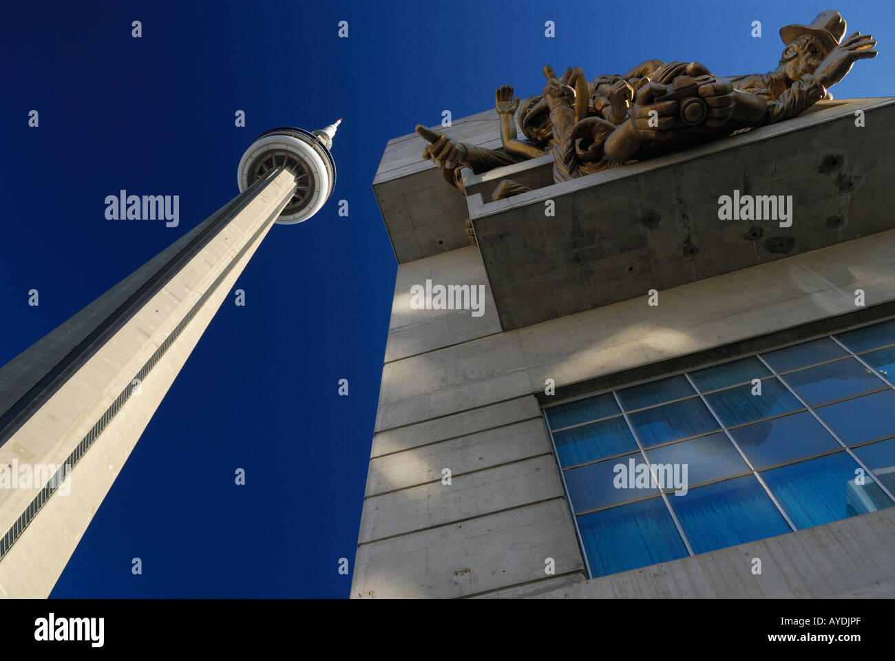 CN tower and Skydome Rogers centre spectator sculpture against a blue sky Toronto Stock Photo