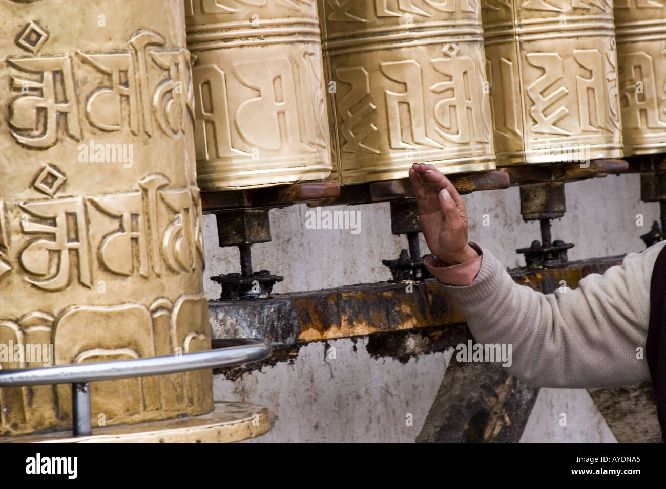 Rotating prayer wheels hi-res stock photography and images - Alamy