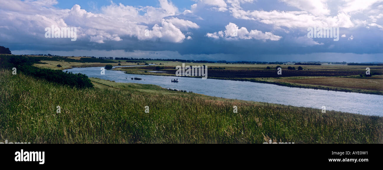 Fly fishing from float tube with guide Macquarie River near Cressy