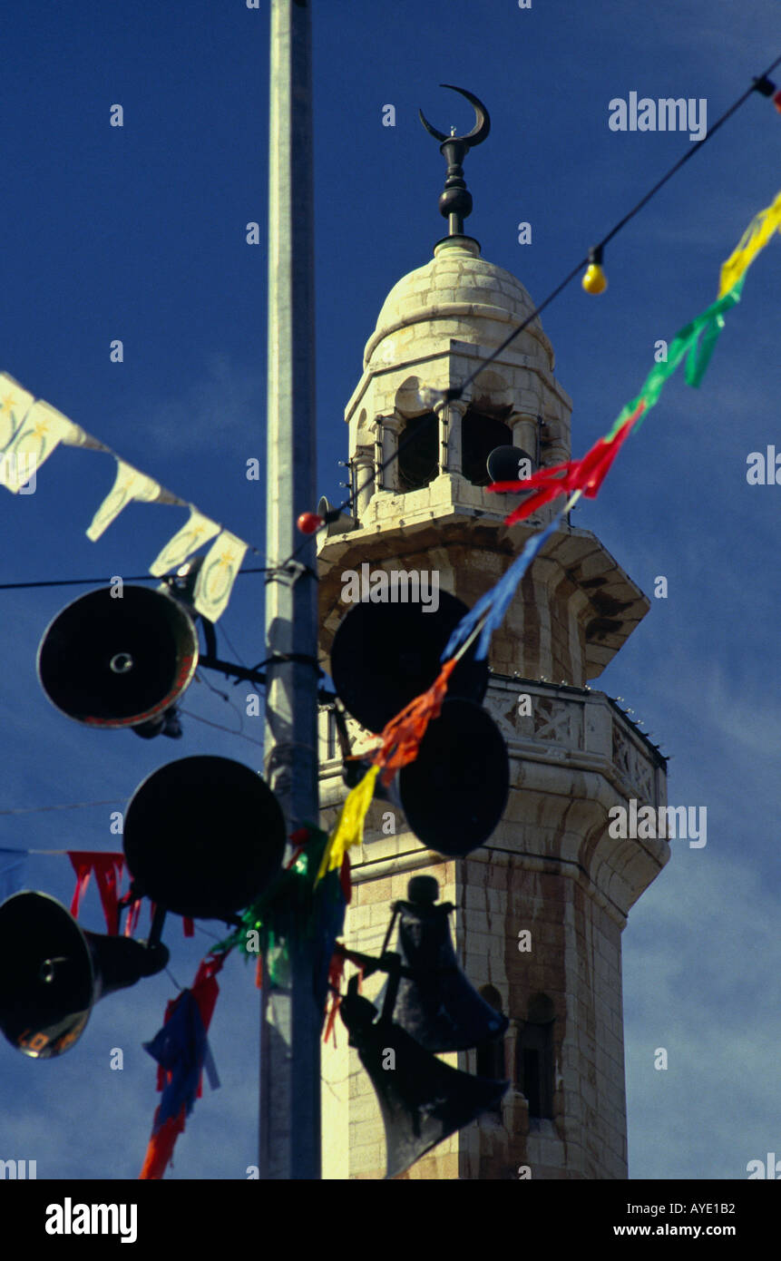 Palestinian authority Bethlehem Manger square C U of a muezzin with high speakers in frgd Stock Photo