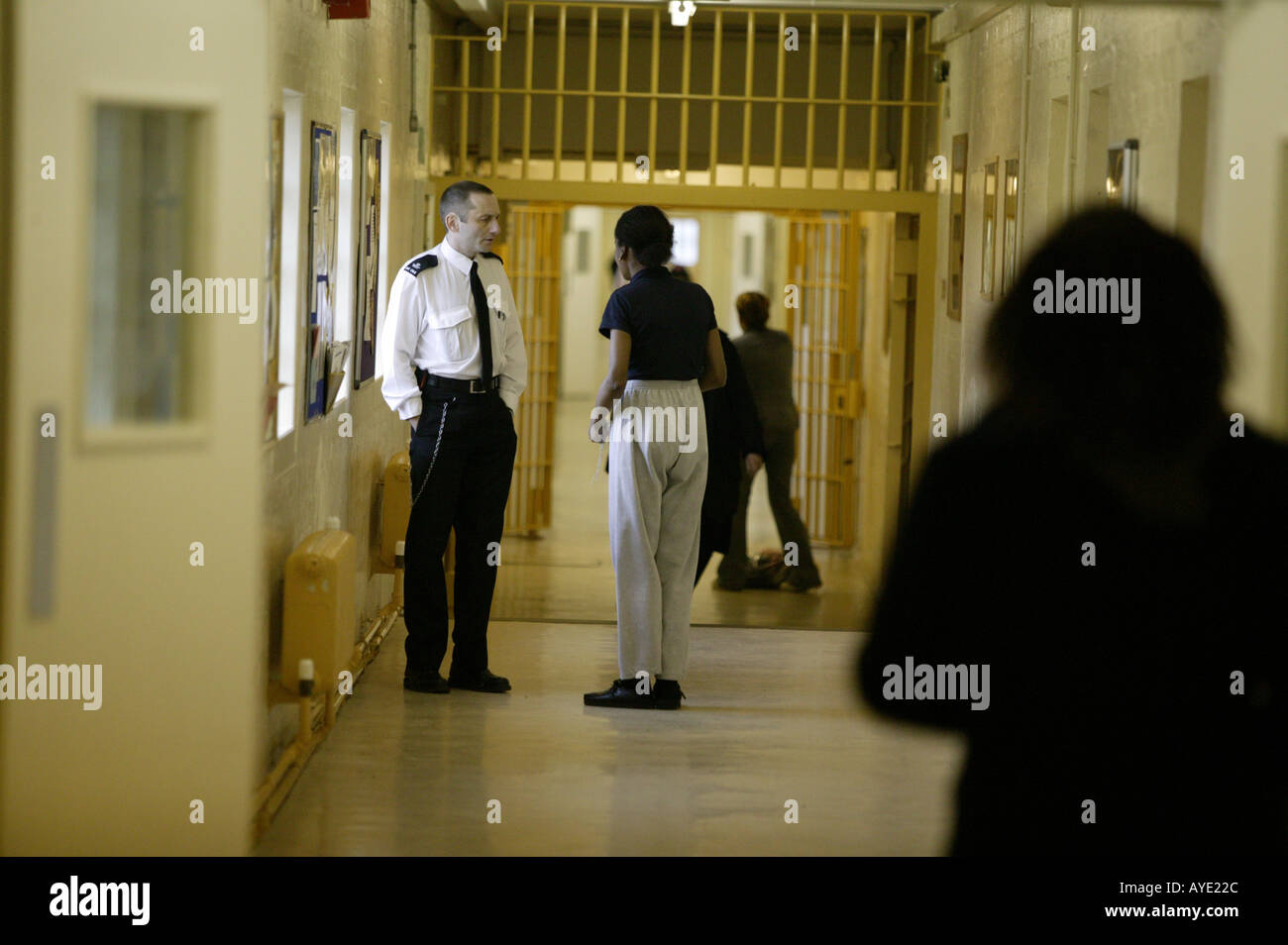 A prison officer chats to an inmate at Brockhill women s prison in Redditch Worcestershire UK Stock Photo