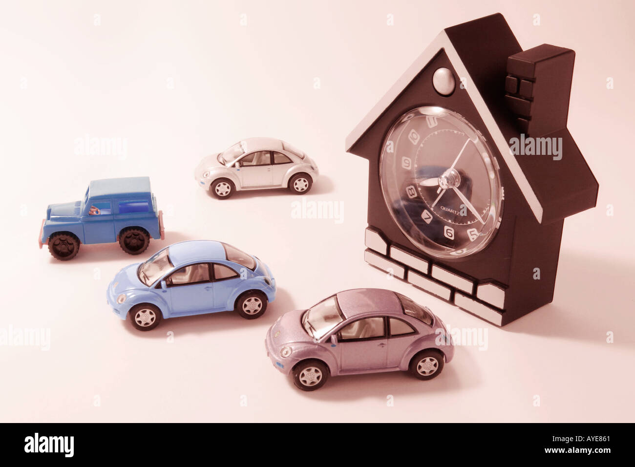 Toy Cars and Houseshaped Clock Stock Photo Alamy