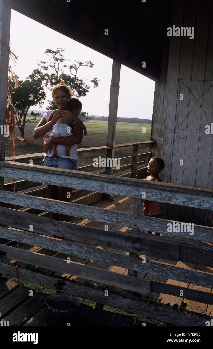 River Amazon, Para. Family of cattle ranch worker Stock Photo