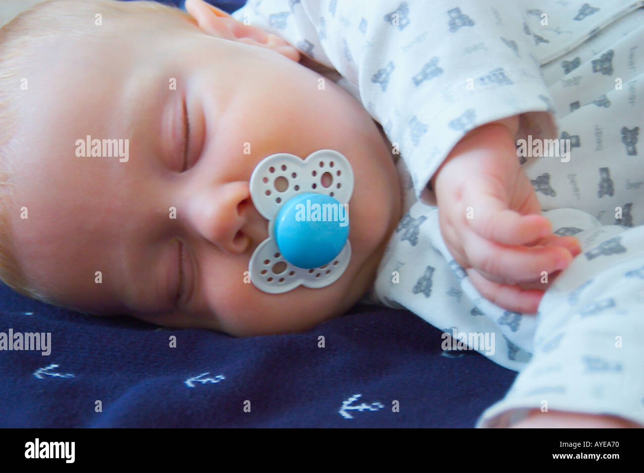 Infant Using Pacifier infant with pacifier Stock Photo - Alamy
