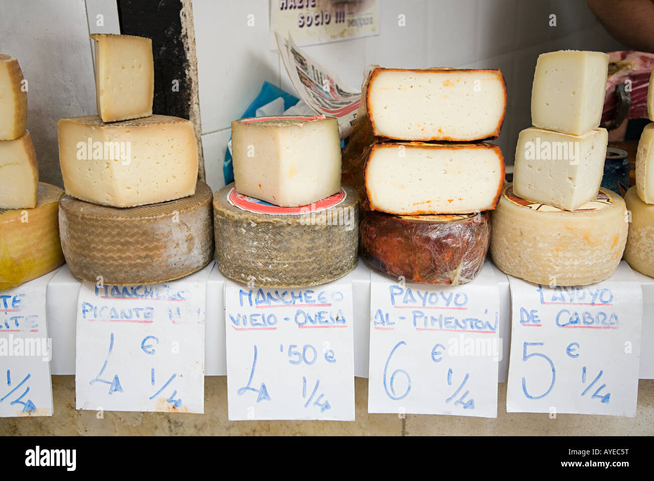 Cheese on a market stall Stock Photo