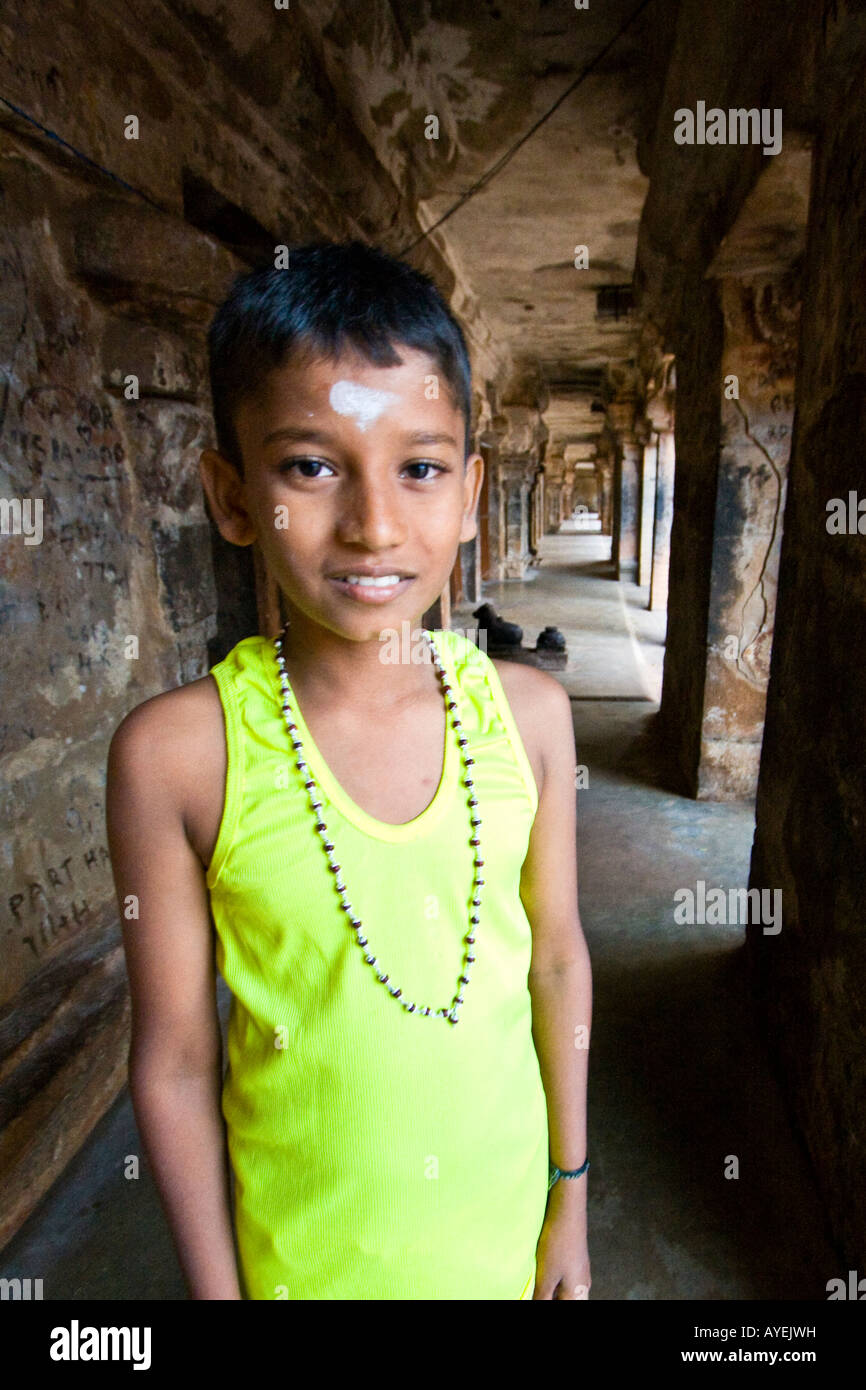 Indian Boy Inside Brihadishwara Hindu Temple in Thanjavur South India Stock Photo